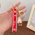 Cute white puppy keychain with red sweater and gold lobster clasp for bags and keys - Dog