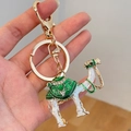 Exotic golden camel keychain with green enamel details and white rhinestones - Green
