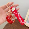Lucky red guardian lion keychain with gold trim and Sweet Heart silicone strap - Pi Xiu Style 2