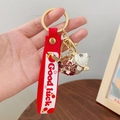 Red lucky koi fish keychain with Good Luck silicone strap and metallic finish - Prosperity Fish