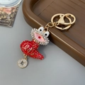 Frosch-Schlüsselanhänger aus Gold mit roten Strasssteinen und Glücksmünze - Rot