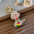 Sparkling rhinestone snake keychain with colorful enamel stripes on a gold metal base - Individual Packaging / Rainbow