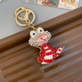 Sparkling crystal snake keychain with pink enamel finish and golden metal clip - Individual Packaging / Red