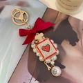 Red bow pearl keychain with crystal perfume bottle and camellia flower bead - Red