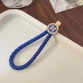 Braided blue leather keychain with golden character charm and sparkling rhinestones - Without Ring Style / Blue