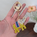 Golden elephant keychain featuring yellow rhinestones and Thailand flag stripe detail - Yellow