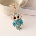 Golden owl keychain with blue and clear crystals, featuring a lobster clasp and ring - Blue