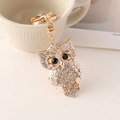 Sparkling crystal encrusted owl keychain in gold finish with lobster clasp and ring - White