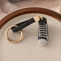 Sparkling black and white rhinestone high-top sneaker keychain with gold metal ring - Black