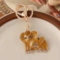 Portachiavi a forma di elefante dorato con glitter e strass bianchi brillanti - Elefante Madre E Figlio Oro (Glitter) / Oro