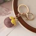 Portachiavi mangostano con strass viola e anello in metallo dorato con chiusura a moschettone - Viola