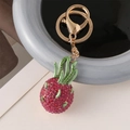 Portachiavi frutto del drago con strass rosa brillanti e dettagli in metallo dorato - Rosa Rossa