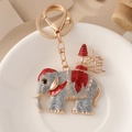 Porte-clés éléphant argenté avec émail rouge et cristaux sur fermoir doré - Gris