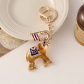 Golden elephant keychain with crystal embellishments and Thai flag design detail - Gold