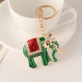 Emerald green elephant keychain with red enamel patterns and sparkling rhinestones - Green