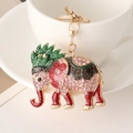 Pink rhinestone elephant keychain with gold metal finish and colorful enamel accents - Green