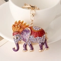 Exquisite gold elephant keychain with purple rhinestones and enamel hanging on a cup - Orange