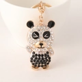 Portachiavi panda scintillante con strass bianchi e neri su base in lega dorata - Nero