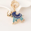 Portachiavi elefante dorato con corona in smalto blu e strass scintillanti per borse - Blu