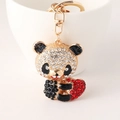 Porte-clés panda scintillant avec cœur rouge et cristaux sur métal doré poli - Rouge