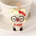 Porte-clés chaton de dessin animé avec nœud rouge et strass en finition jaune vif - Jaune Pâle