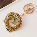 Llavero de dragón dorado con diamantes de imitación ámbar y cierre de langosta - Dorado