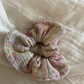 Detailed view of colorful bouclé weave hair scrunchie with soft pink and blue pastel tones - 1# White Pink Dot Scrunchie