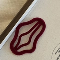 Close-up of burgundy wavy hair clip featuring a premium flocked velvet texture finish - Flocked Hair Clip / Burgundy