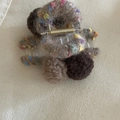 Brown fluffy lamb wool ball hair claw clip with golden spring on beige canvas - Milk Tea Khaki Plush Ball Claw Clip