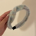 Detailed view of the soft light blue fuzzy knit headband with plush texture and non-slip ends - 1# Blue Color Flecked Wool Headband