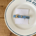 Blue denim BB hair clip with golden bear and crystal heart detail on card - Light Denim Blue Bear Hair Tie