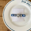 Retro denim hair clip with vintage cameo portrait and elegant pearls on white display card - Dark Denim Blue Cameo Portrait Hair Clip