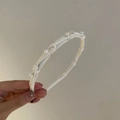 Elegant Korean style cream fabric headband with pearl accents and knotted texture for women - White