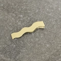 Elegante fermaglio per capelli ondulato in metallo dorato con finitura opaca spazzolata - Oro