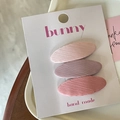 Set mit 3 Vintage-Haarspangen aus Stoff in Unifarben für Mädchen auf einer Displaykarte - Verlauf Rosa