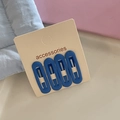 Set of four matte blue oval hair clips displayed on an accessories card for girls - Hair Clip Set / Dark Blue
