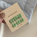 Three-piece set of pale green dog bone hair clips on a display card for girls - Light Green Bone Set