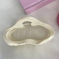 Detail view of cream white matte hair claw clip with artistic organic wave design - Round Irregular Wave Style / Creamy White (No. 1)