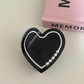 Elegant heart-shaped shark hair claw in black with pearl accents and minimalist white outline - Black Heart (Black)