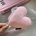 Handheld view of a Korean pink plush heart hair claw clip made of clear acrylic - Pink Large Heart Cross Hair Claw