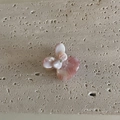 Close-up of pink marble pattern butterfly hair claw with a sparkling center rhinestone - Pink White Marble Rabbit Claw