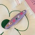 Chic purple Y2K rhinestone hair clip with pink star on a soft textured background - Purple Oval Hair Clip (12)