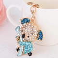 Portachiavi a forma di koala con strass blu e bianchi su base in metallo dorato - Blu