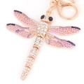 Goldener Libellen-Schlüsselanhänger mit violetten und schwarzen Strasssteinen - Lila