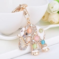 Gouden olifant sleutelhanger met witte strassteentjes en gekleurde edelstenen - Meerkleurige Olifant Hanger / Regenboog