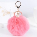 Pink faux fur pompom keychain with white pearl and gold clasp on white background - 14cm 8x8cm / Peach