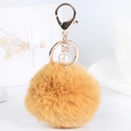 Ginger faux fur pompom keychain with white pearl and gold metal hardware - 14cm 8x8cm / Yellow
