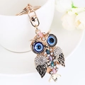 Golden owl keychain with colorful rhinestones and evil eye design for handbags - Rainbow