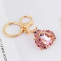 Golden ladybug keychain pendant featuring pink drop-shaped crystal and lobster clasp - Pink
