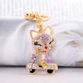 Exquise gouden vos op motorfiets sleutelhanger met paarse strass en emaille afwerking - Paars
